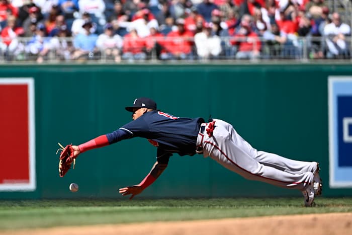 Mar 30, 2023; Washington, District of Columbia, USA; Atlanta Braves second baseman Orlando Arcia (11) is unable to catch a fly ball hit by Washington Nationals first baseman Dominic Smith (22) during the second inning at Nationals Park. Mandatory Credit: Brad Mills-USA TODAY Sports